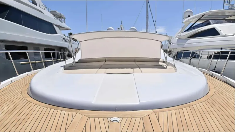  Yacht Photos Pics Luxurious 2009 Mangusta 92 yacht with spacious sun deck and elegant design.