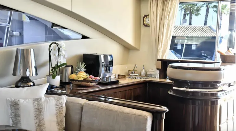  Yacht Photos Pics Luxurious interior of 2009 Mangusta 92 yacht with elegant decor and modern amenities.