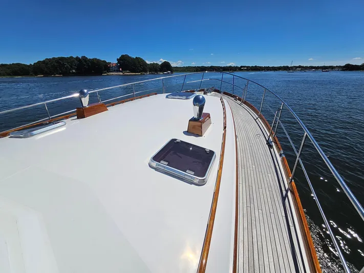 Ballena Yacht Photos Pics 2002 Grand Banks 49 Eastbay HX yacht deck with scenic water view.