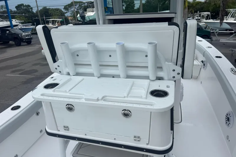  Yacht Photos Pics 2026 Blackfin 262 HB boat with rod holders and storage compartment on deck.