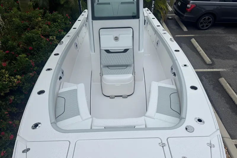  Yacht Photos Pics 2026 Blackfin 262 HB boat interior with seating and storage compartments.