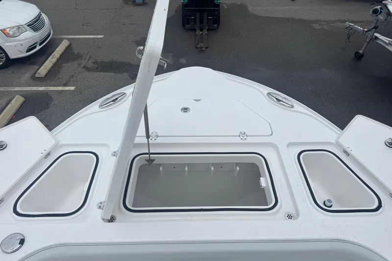  Yacht Photos Pics 2026 Blackfin 262 HB boat deck with open storage compartments.