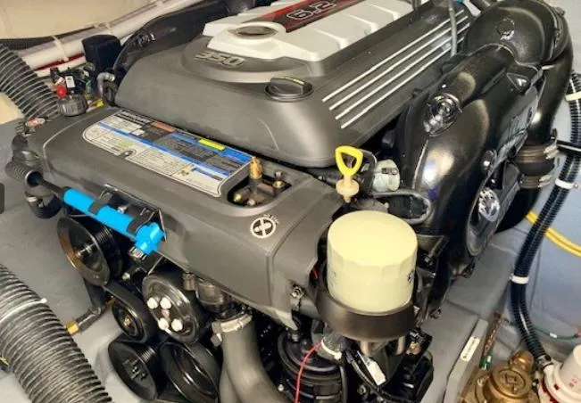  Yacht Photos Pics Engine of a 2016 Carver C37 boat, showcasing detailed components and design.