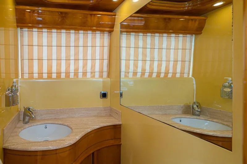 Yacht Photos Pics Luxurious bathroom with dual sinks and large mirror on Astondoa 82 GLX yacht, 2000 model.