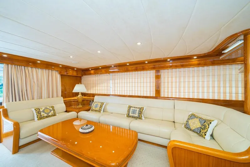  Yacht Photos Pics Luxurious interior of 2000 Astondoa 82 GLX yacht with elegant seating and wooden accents.