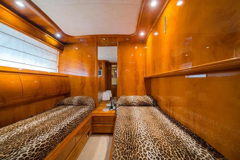  Yacht Photos Pics Luxurious twin cabin with leopard print bedding in 2000 Astondoa 82 GLX yacht.
