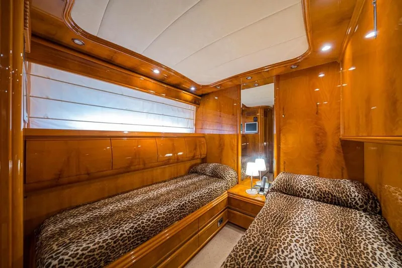 Yacht Photos Pics Luxurious twin cabin with leopard print bedding on 2000 Astondoa 82 GLX yacht.