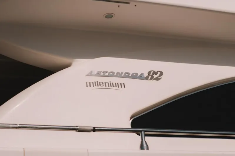  Yacht Photos Pics Astondoa 82 GLX yacht, 2000 model, featuring "Millenium" branding on the side.