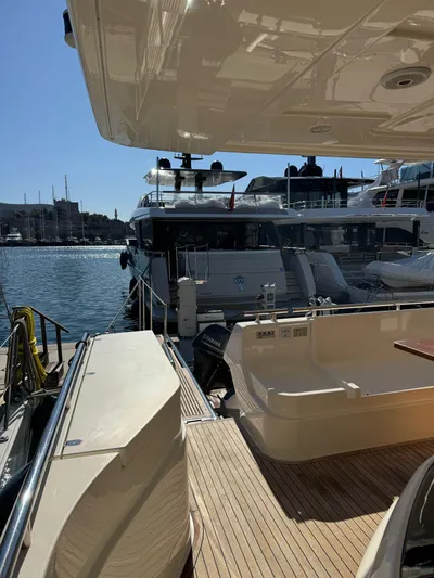  Yacht Photos Pics 2016 Ferretti Yachts 750 docked, showcasing luxury deck and marina view.