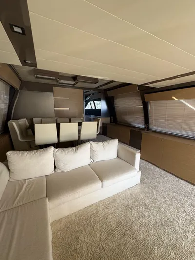  Yacht Photos Pics Luxurious interior of a 2016 Ferretti Yachts 750 with plush seating and elegant dining area.