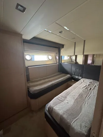  Yacht Photos Pics Luxurious cabin interior of 2016 Ferretti Yachts 750 with modern design and cozy beds.