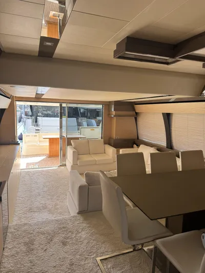  Yacht Photos Pics Luxurious interior of a 2016 Ferretti Yachts 750, featuring elegant seating and dining area.