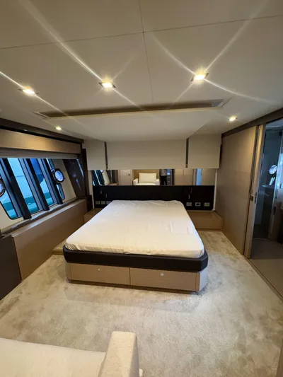  Yacht Photos Pics Luxurious bedroom interior of 2016 Ferretti Yachts 750, featuring modern design and ample natural light.