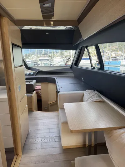  Yacht Photos Pics Interior of 2016 Ferretti Yachts 750, featuring modern design and spacious seating area.