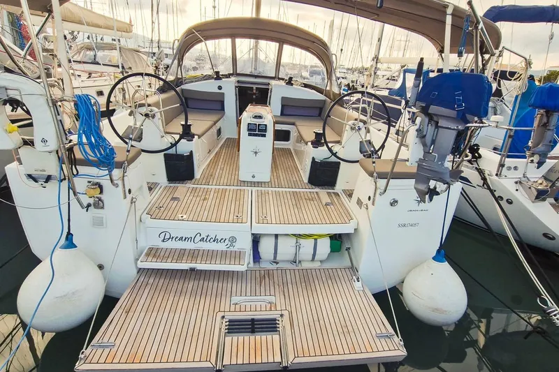 Dreamcatcher II Yacht Photos Pics 2019 Jeanneau Sun Odyssey 440 sailboat with dual steering wheels and spacious deck.