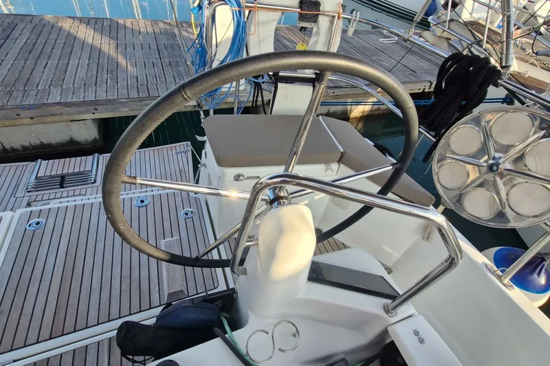 Dreamcatcher II Yacht Photos Pics Steering wheel of 2019 Jeanneau Sun Odyssey 440 sailboat at dock.