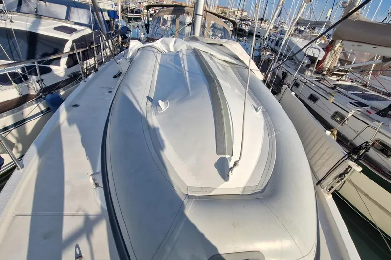 Dreamcatcher II Yacht Photos Pics 2019 Jeanneau Sun Odyssey 440 sailboat docked in a marina, showcasing sleek deck design.