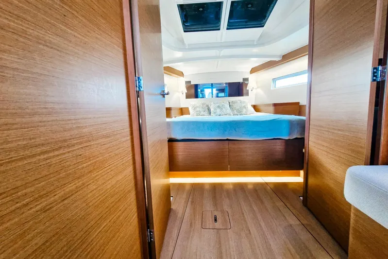 Dreamcatcher II Yacht Photos Pics Luxurious interior of 2019 Jeanneau Sun Odyssey 440 yacht with cozy bedroom.