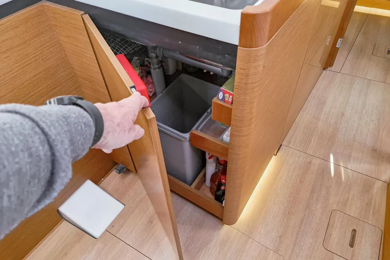 Dreamcatcher II Yacht Photos Pics Interior view of 2019 Jeanneau Sun Odyssey 440 yacht kitchen storage area.