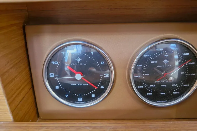 Dreamcatcher II Yacht Photos Pics Jeanneau Sun Odyssey 440 2019 dashboard with clock and barometer instruments.