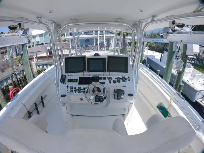  Yacht Photos Pics 2009 Hydra-Sports 41 Sport Fish boat cockpit with advanced navigation controls and displays.