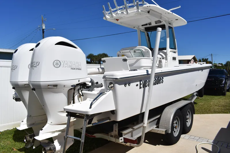  Yacht Photos Pics 2018 Everglades 273 Center Console boat with twin Yamaha engines on a trailer.