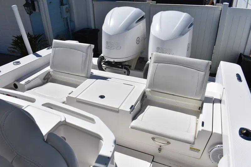  Yacht Photos Pics 2018 Everglades 273 Center Console boat with dual Yamaha 250 engines and white seating.
