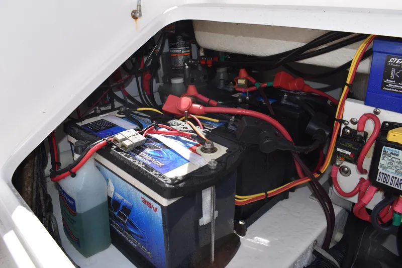  Yacht Photos Pics 2018 Everglades 273 Center Console boat battery compartment with wiring and components.