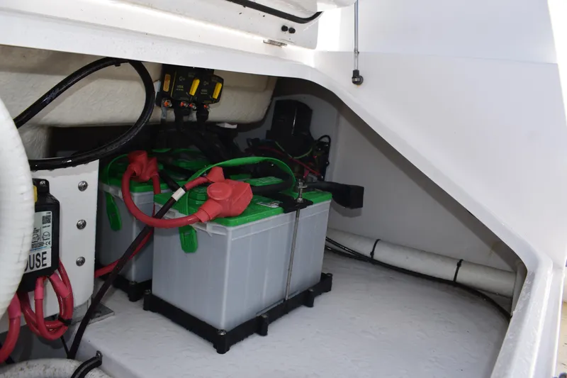  Yacht Photos Pics Battery compartment of 2018 Everglades 273 Center Console boat, showing wiring and connections.
