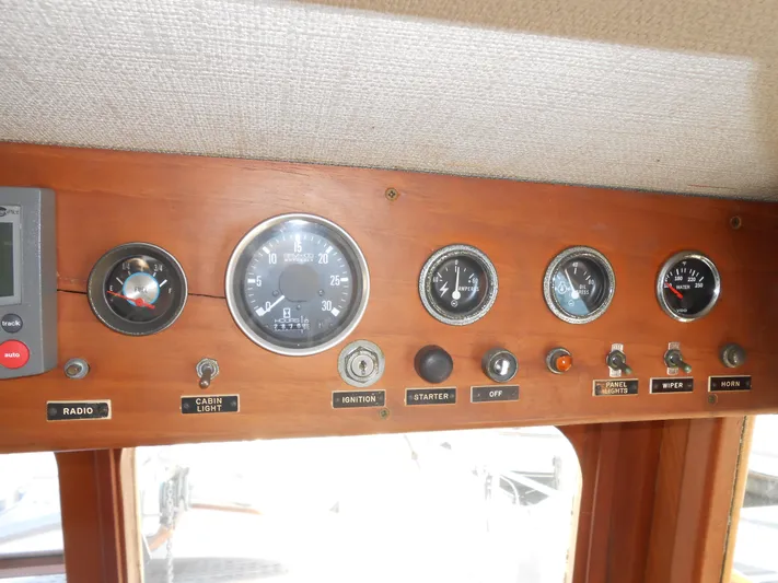 Ahoy Vey Yacht Photos Pics 1978 CHB 34 Aft Cabin dashboard with gauges and controls.
