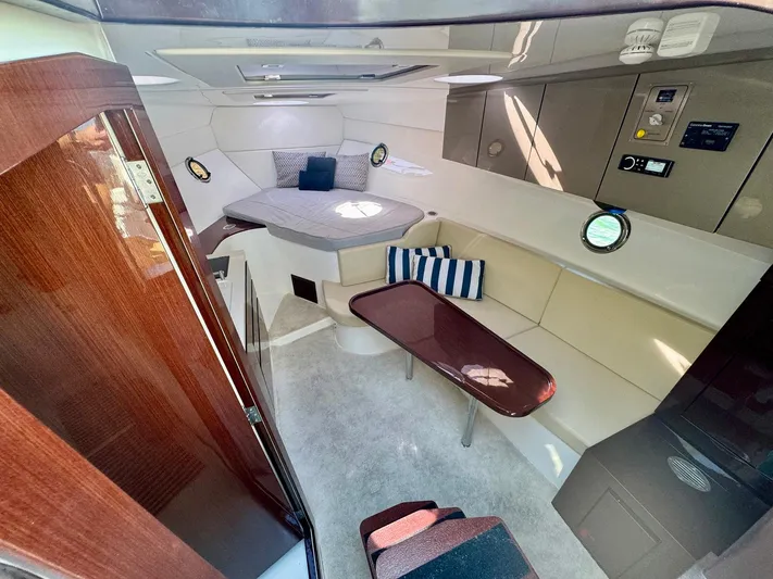 Dream Big Yacht Photos Pics Luxurious interior of 2023 Schaefer 375 yacht with seating, table, and modern amenities.