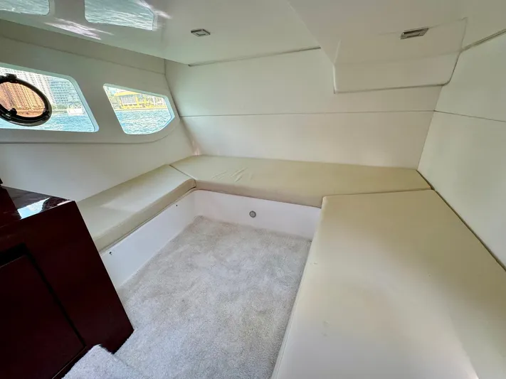Dream Big Yacht Photos Pics Interior of 2023 Schaefer 375 yacht with white seating and carpet.
