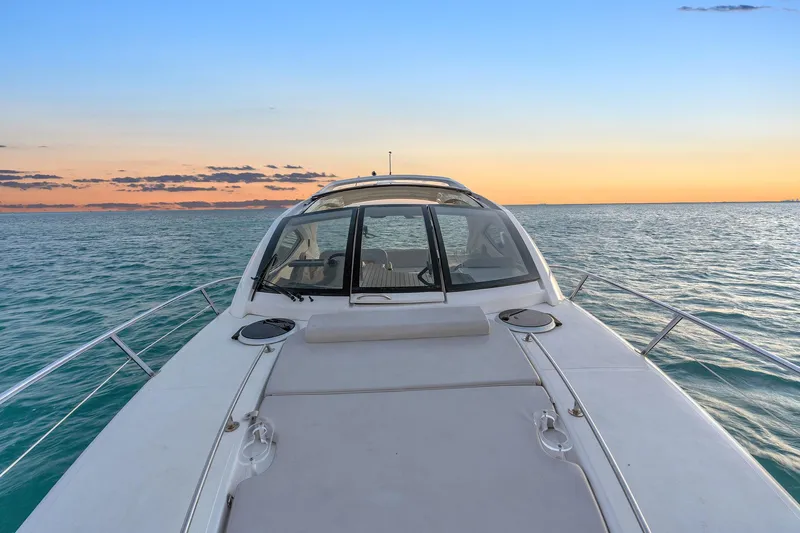 Dream Big Yacht Photos Pics Schaefer 375 yacht on calm sea at sunset, 2023 model.