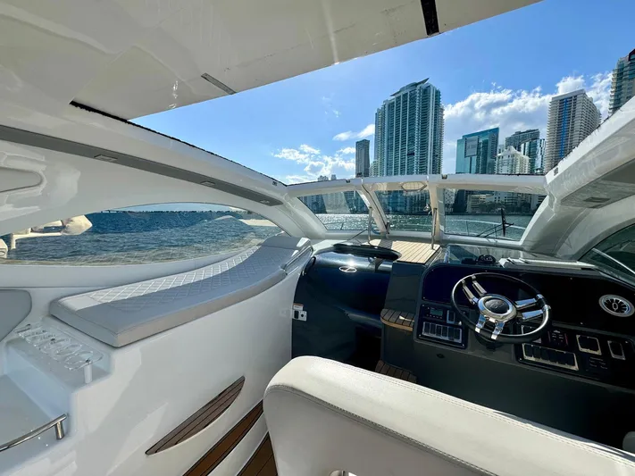 Dream Big Yacht Photos Pics Interior view of 2023 Schaefer 375 yacht with city skyline in background.