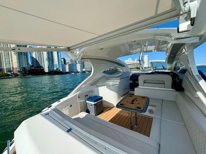Dream Big Yacht Photos Pics Luxurious 2023 Schaefer 375 yacht interior with city skyline view.