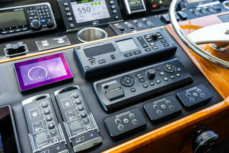 Backlash Yacht Photos Pics Control panel of 2023 Viking 72 Enclosed Bridge yacht with advanced navigation systems.
