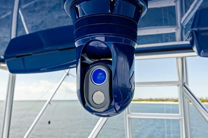 Backlash Yacht Photos Pics Close-up of a camera on a 2023 Viking 72 Enclosed Bridge yacht.