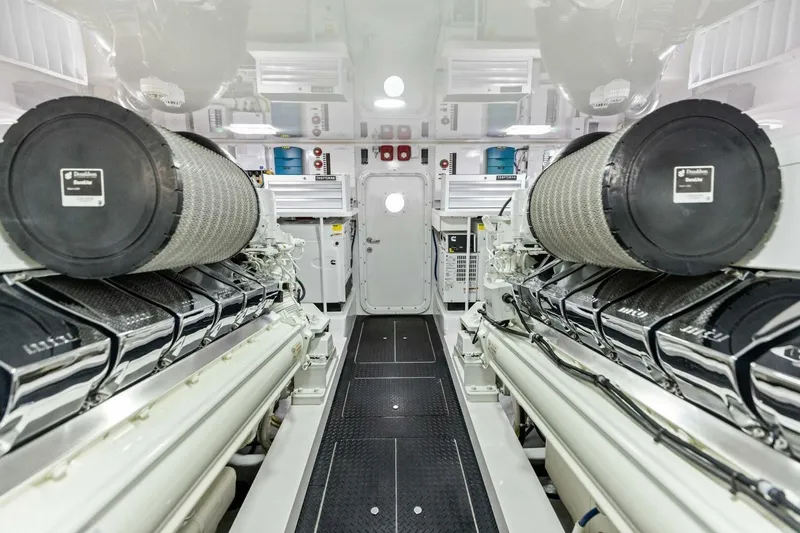 Backlash Yacht Photos Pics Engine room of 2023 Viking 72 Enclosed Bridge yacht, showcasing advanced machinery and equipment.