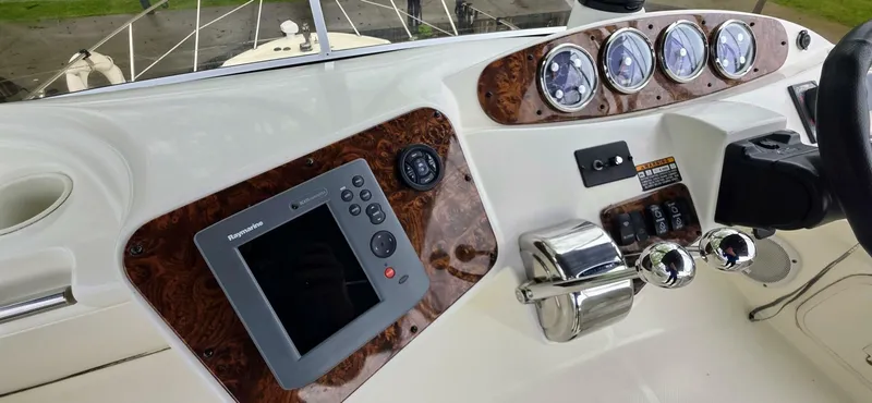  Yacht Photos Pics Control panel of a 2005 Meridian 368 Motor Yacht with navigation and gauges.