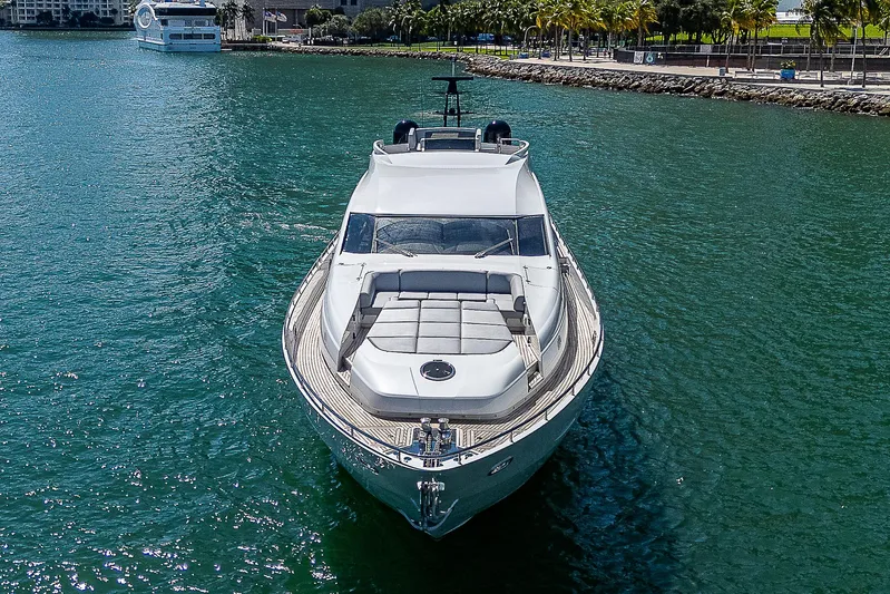 Scissortail II Yacht Photos Pics 2013 Pershing 92 Express yacht cruising in clear blue waters.