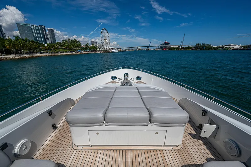 Scissortail II Yacht Photos Pics 2013 Pershing 92 Express yacht deck with city skyline and Ferris wheel view.
