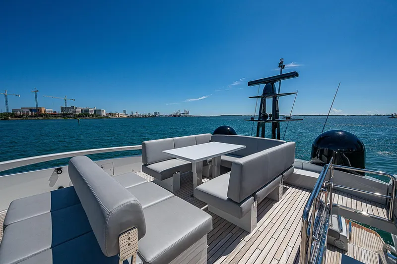 Scissortail II Yacht Photos Pics 2013 Pershing 92 Express yacht with luxurious outdoor seating on deck.