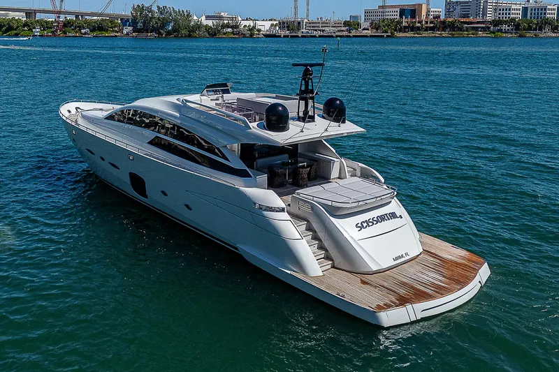 Scissortail II Yacht Photos Pics 2013 Pershing 92 Express yacht cruising on clear blue waters.