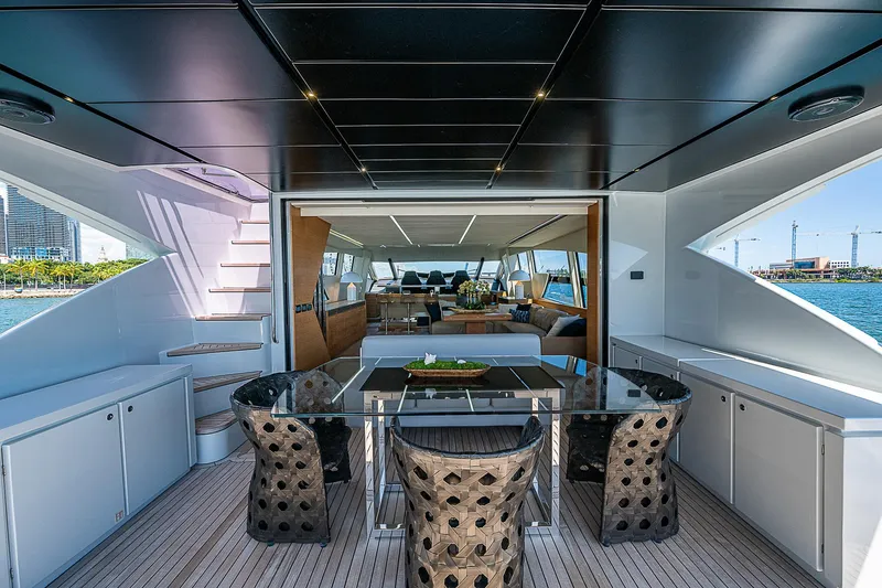Scissortail II Yacht Photos Pics Luxurious 2013 Pershing 92 Express yacht interior with elegant dining area and modern design.