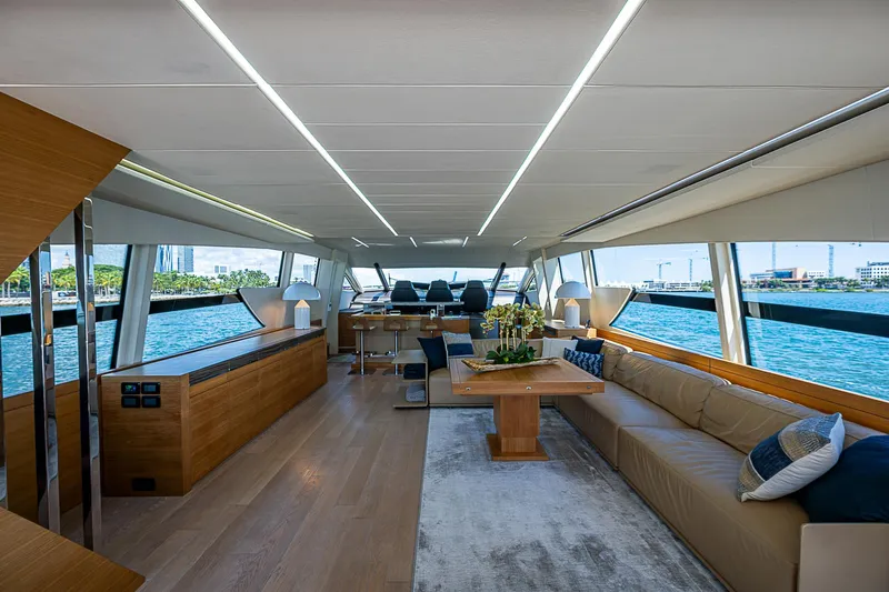 Scissortail II Yacht Photos Pics Luxurious interior of 2013 Pershing 92 Express yacht with modern furnishings and panoramic windows.