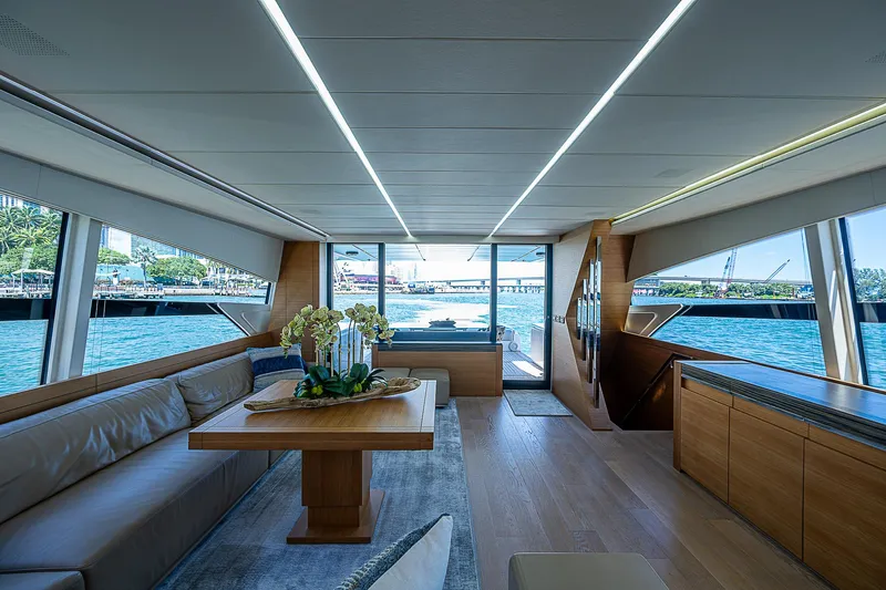 Scissortail II Yacht Photos Pics Luxurious interior of 2013 Pershing 92 Express yacht with elegant seating and panoramic windows.