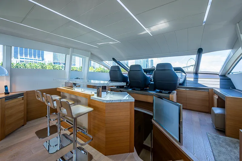 Scissortail II Yacht Photos Pics Luxurious interior of 2013 Pershing 92 Express yacht with modern seating and sleek design.