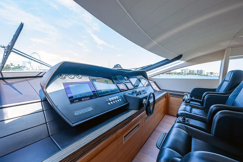 Scissortail II Yacht Photos Pics Luxurious 2013 Pershing 92 Express yacht cockpit with modern navigation controls.