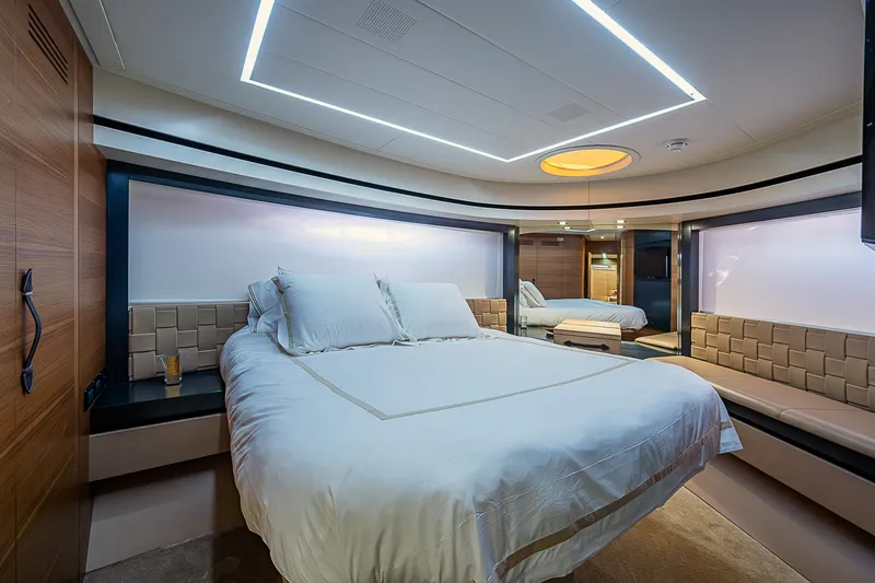 Scissortail II Yacht Photos Pics Luxurious bedroom interior of 2013 Pershing 92 Express yacht with modern design.