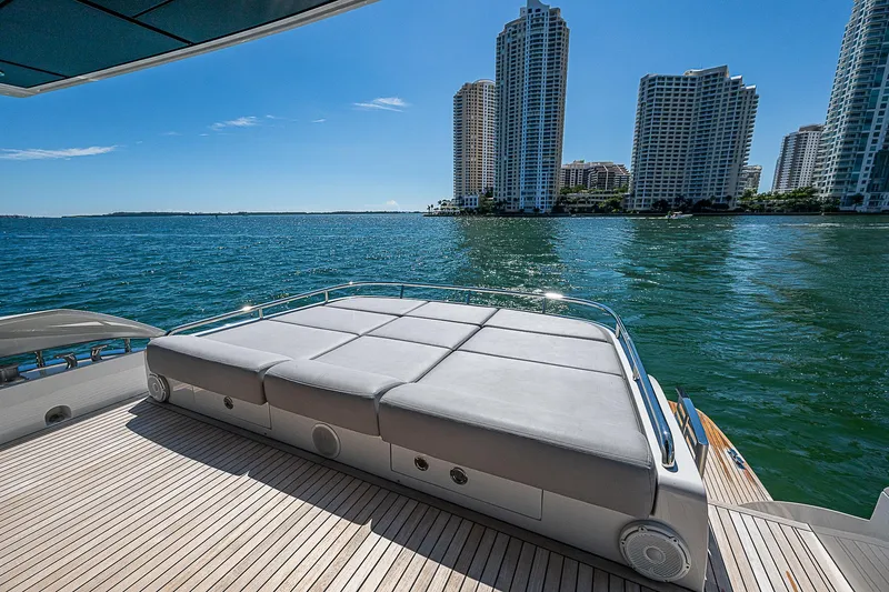 Scissortail II Yacht Photos Pics Luxury 2013 Pershing 92 Express yacht deck with city skyline view.